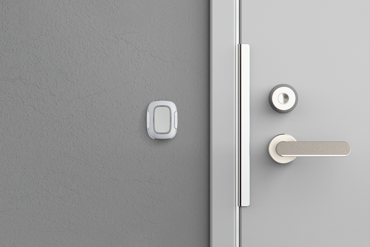 Ajax double wireless panic button fitted discreetly on a staff room wall